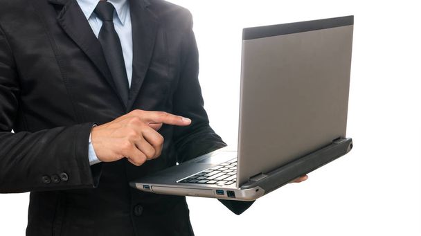 Liikemies käyttää kannettavaa tietokonetta
  - Valokuva, kuva