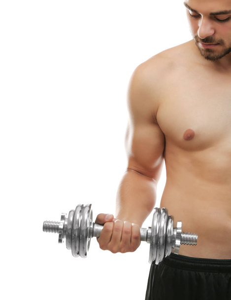 Sporty man with dumbbell isolated on white - Photo, image