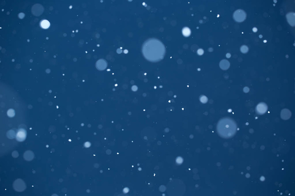 Falling Snow On The Blue Background - Fotoğraf, Görsel
