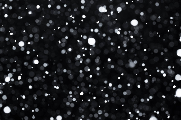 Falling snow on black - Foto, immagini