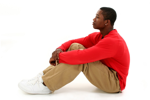 Casual Young Man Sitting On Floor - Foto, imagen