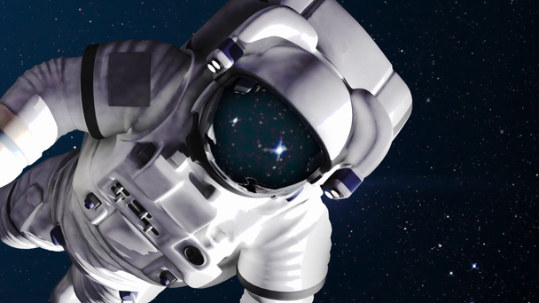 El astronauta en el espacio exterior contra las estrellas
 - Imágenes, Vídeo