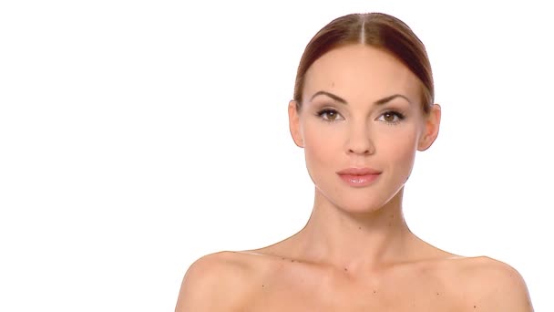 Portrait of beautiful and sexy woman on white - Кадри, відео
