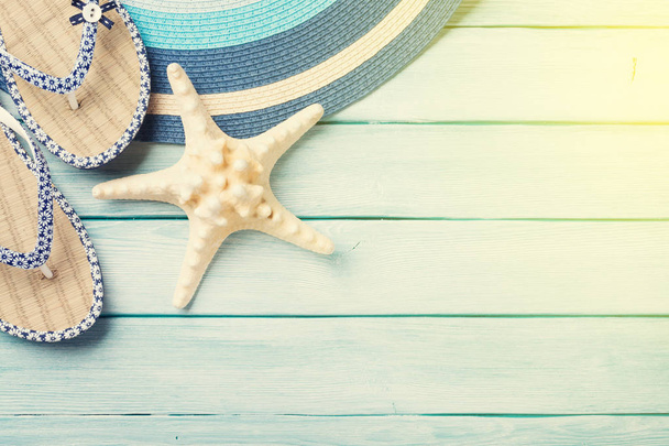 Beach accessories on wooden background - Photo, image