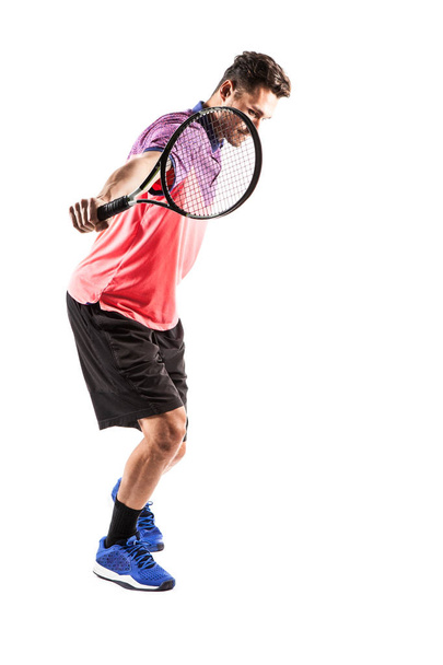 Young man is playing tennis  - Foto, Imagen