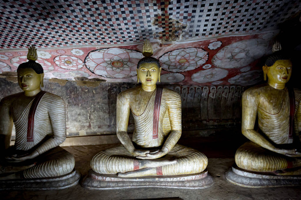 Buddha statues in cave monastery Dambulla - Photo, Image