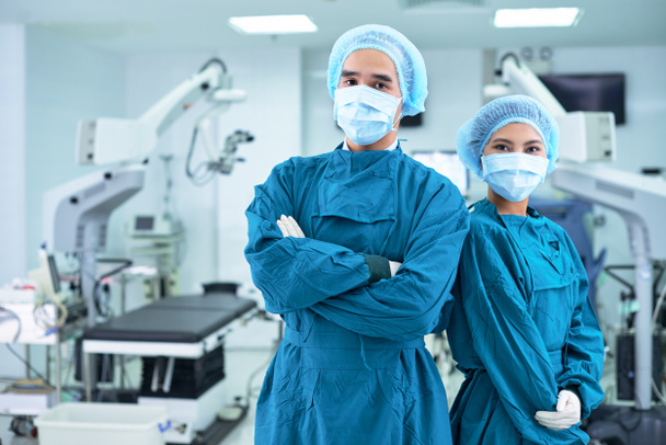 surgeons in surgery room - Photo, Image