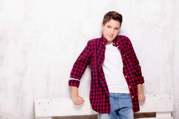 Young teenage boy posing. - Фото, изображение