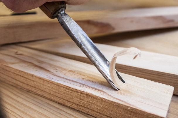 Gouge wood chisel carpenter tool working wooden background - Photo, Image