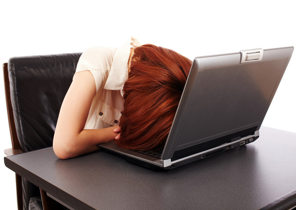 Woman sleeping on her computer - Фото, зображення