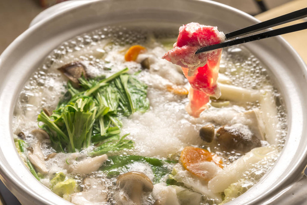 Hot pot dish cooked with delicious radish - 写真・画像