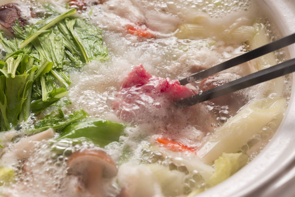Hot pot dish cooked with delicious radish - Фото, изображение