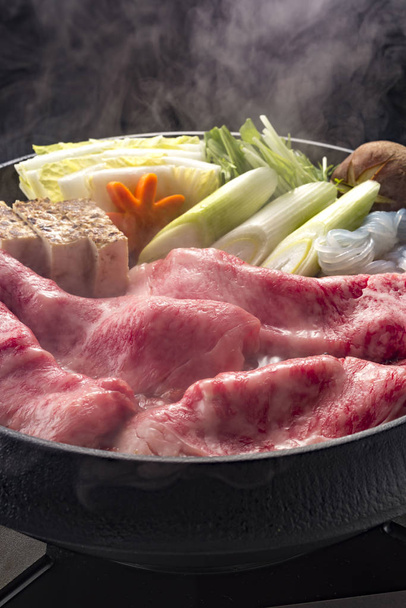 Delicious beef sukiyaki cooking pot - Photo, Image