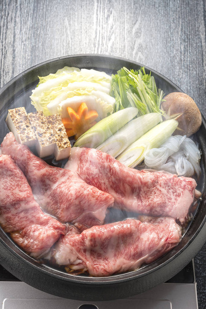 Pyszna wołowina sukiyaki garnek do gotowania - Zdjęcie, obraz
