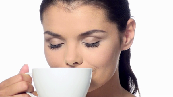 Portrait of beautiful woman with cup of coffee - Záběry, video