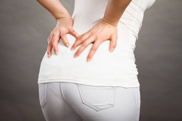 Woman suffering from back pain - Φωτογραφία, εικόνα