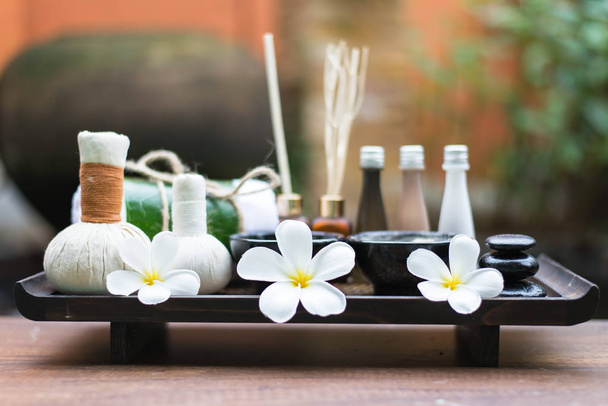 Spa massage compress balls, herbal ball on the wooden with treaments spa , Thailand, select focus  - 写真・画像