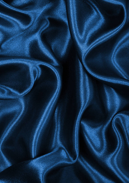 Smooth elegant blue silk or satin as background - Fotó, kép