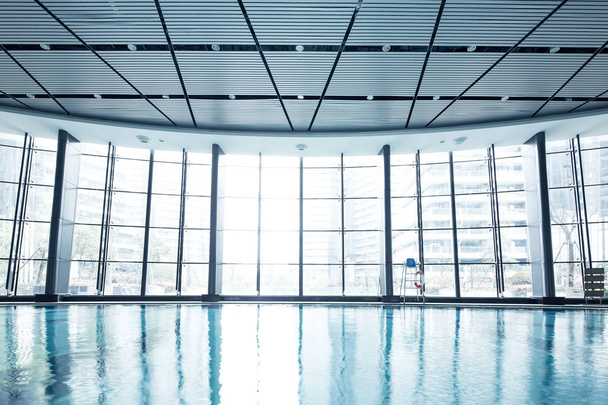 bright indoors swimming pool - Fotoğraf, Görsel