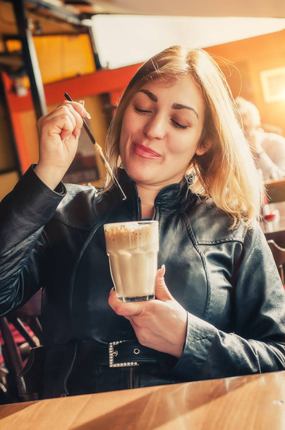 Relaxed woman enjoying her coffee - Fotoğraf, Görsel