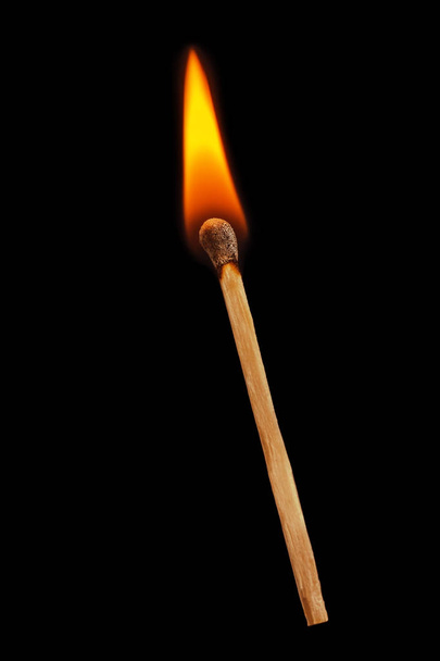 Matchstick on a black background. - Photo, Image