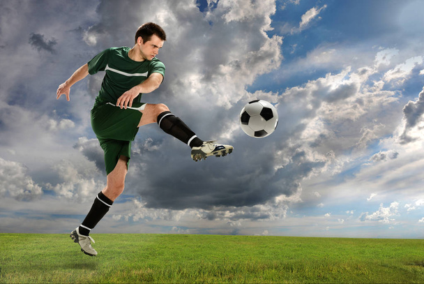 Soccer Player Kicking Ball Outdoors - Fotoğraf, Görsel