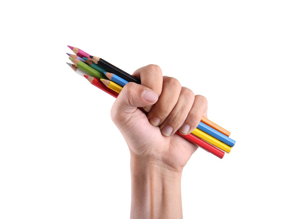 Χέρι που κρατά το μολύβι χρώματα που απομονώνονται - Φωτογραφία, εικόνα