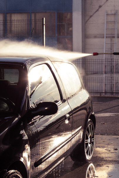 car wash with pressure washer - 写真・画像