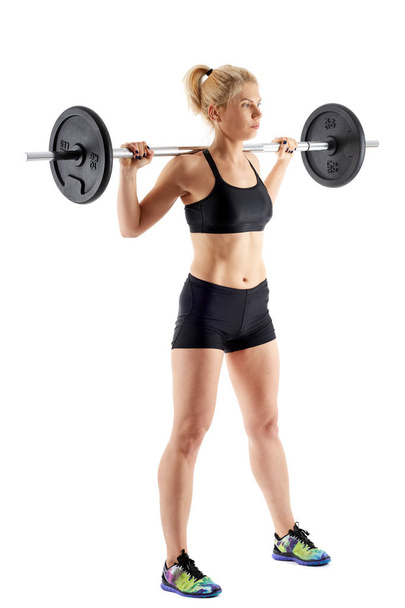 Fitness girl doing barbell squats - Foto, Imagem
