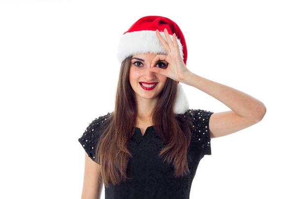 happy girl in santa hat - Foto, afbeelding