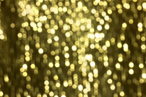 Glitter sparkling abstract gold bokeh defocused background - Foto, afbeelding