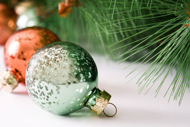 Christmas balls and Christmas tree isolated on white background - Foto, imagen
