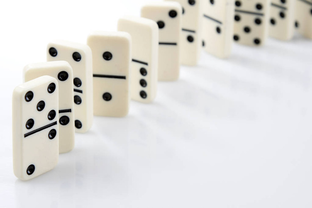 Dominoes in a row - 写真・画像