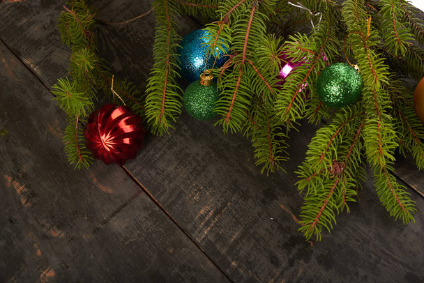 Christmas tree and decorations on wooden background - Photo, Image