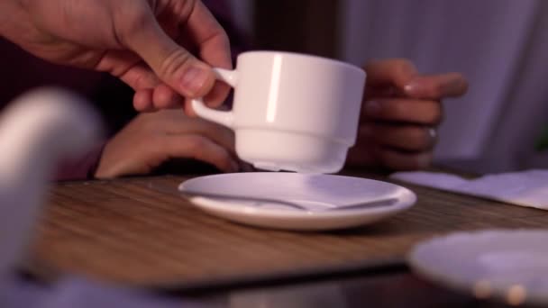 Waitress serving cup close up of hand - Felvétel, videó