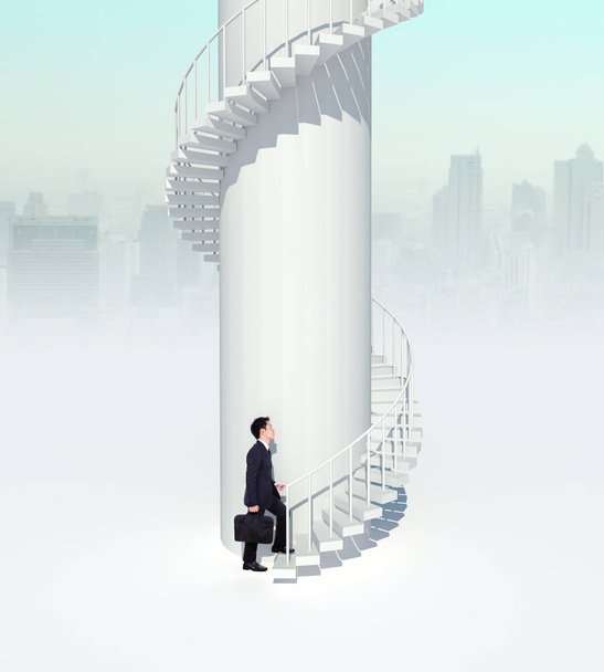 business man going upstairs in curved staircase to success  - Photo, Image