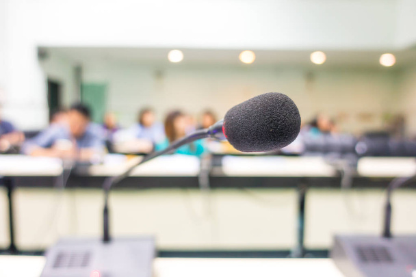Black microphone in conference room ( Filtered image processed v - Fotó, kép
