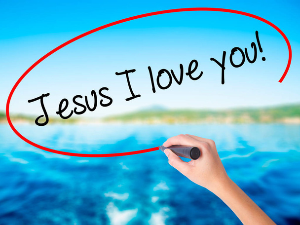Woman Hand Writing Jesus ¡Te amo! con un marcador sobre el transpar
 - Foto, Imagen