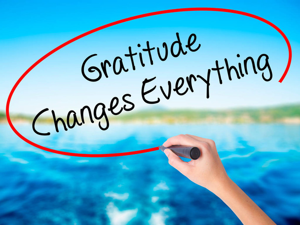 Woman Hand Writing Gratitude Changes Everything with a marker ov - Photo, Image
