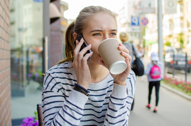 Young woman with tasty coffee - Fotoğraf, Görsel