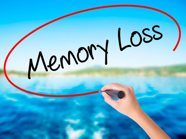 Woman Hand Writing Memory Loss with a marker over transparent bo - Photo, Image