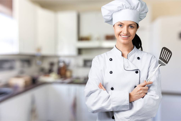 Portrait of young woman chef - 写真・画像
