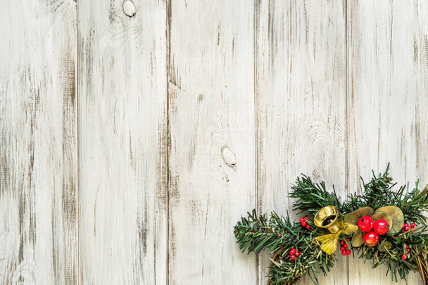 Ornamental Christmas wreath on wooden door decoration, home decor - Fotografie, Obrázek