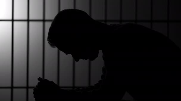 silhouette of man in prison
 - Кадры, видео