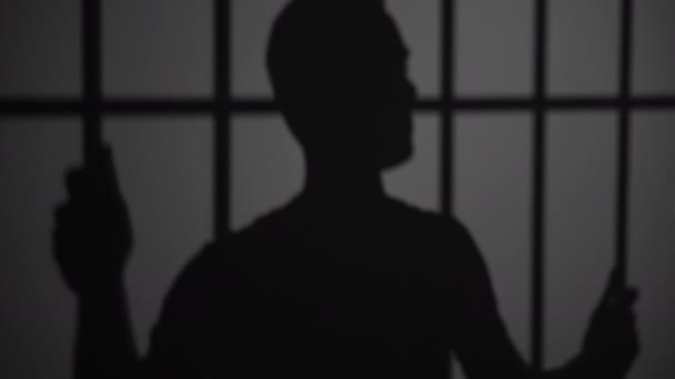 σιλουέτα του ανθρώπου στη φυλακή - Πλάνα, βίντεο