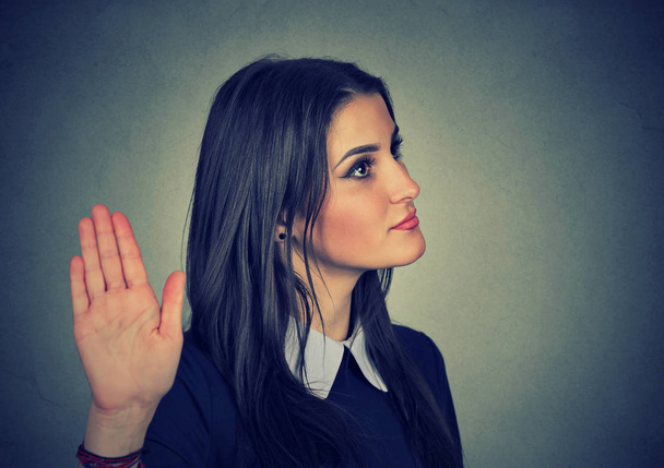 annoyed woman with bad attitude giving talk to hand gesture - Foto, imagen