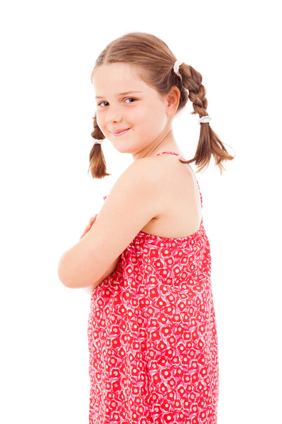 Happy smiling little girl standing with arms crossed on white ba - Foto, Imagem