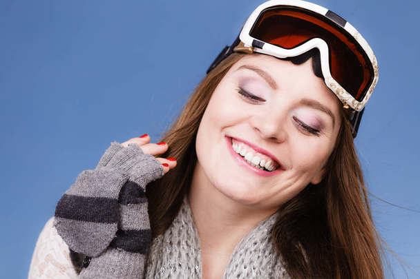 skier girl wearing warm clothes ski googles portrait.  - Фото, изображение
