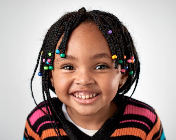 adorable little girl with african pigtails - Photo, Image