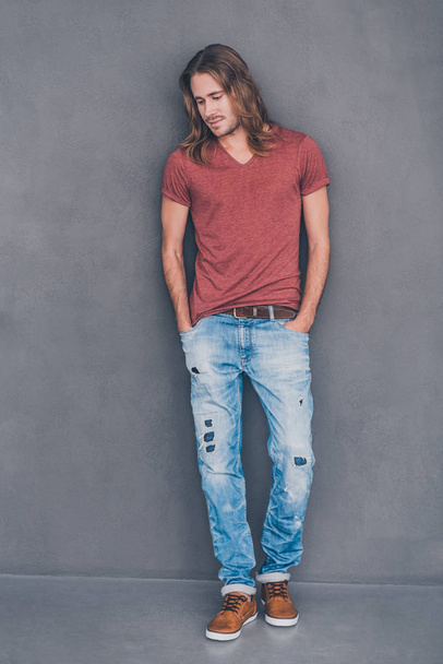man with long hair in casual wear  - Foto, afbeelding